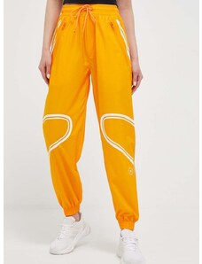Hlače za trening adidas by Stella McCartney TruePace boja: narančasta, s tiskom