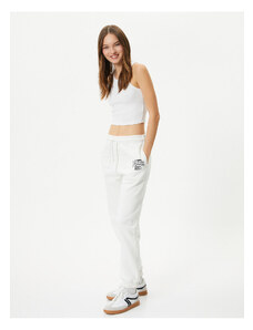 Koton Jogger Sweatpants with Fastener at the Waist, Print Detailed with Pockets.