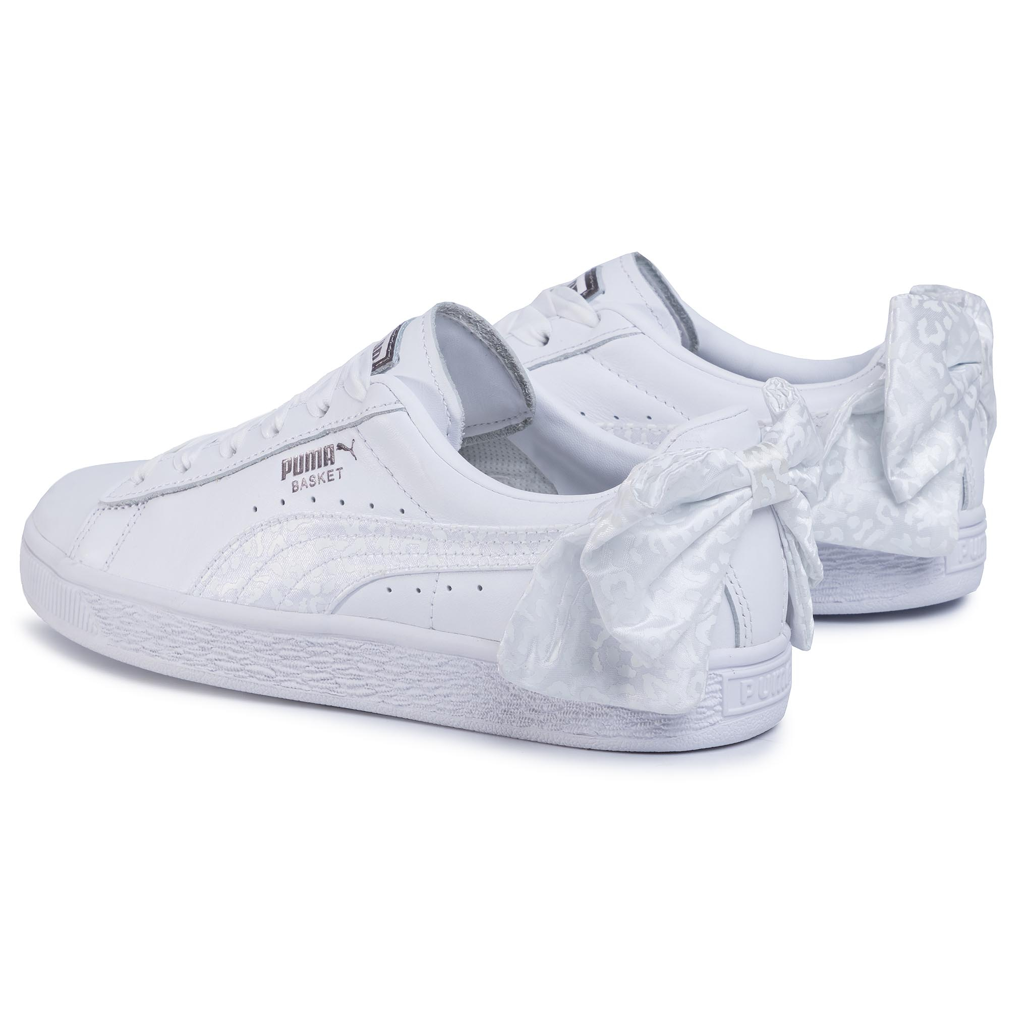 puma with bow at back