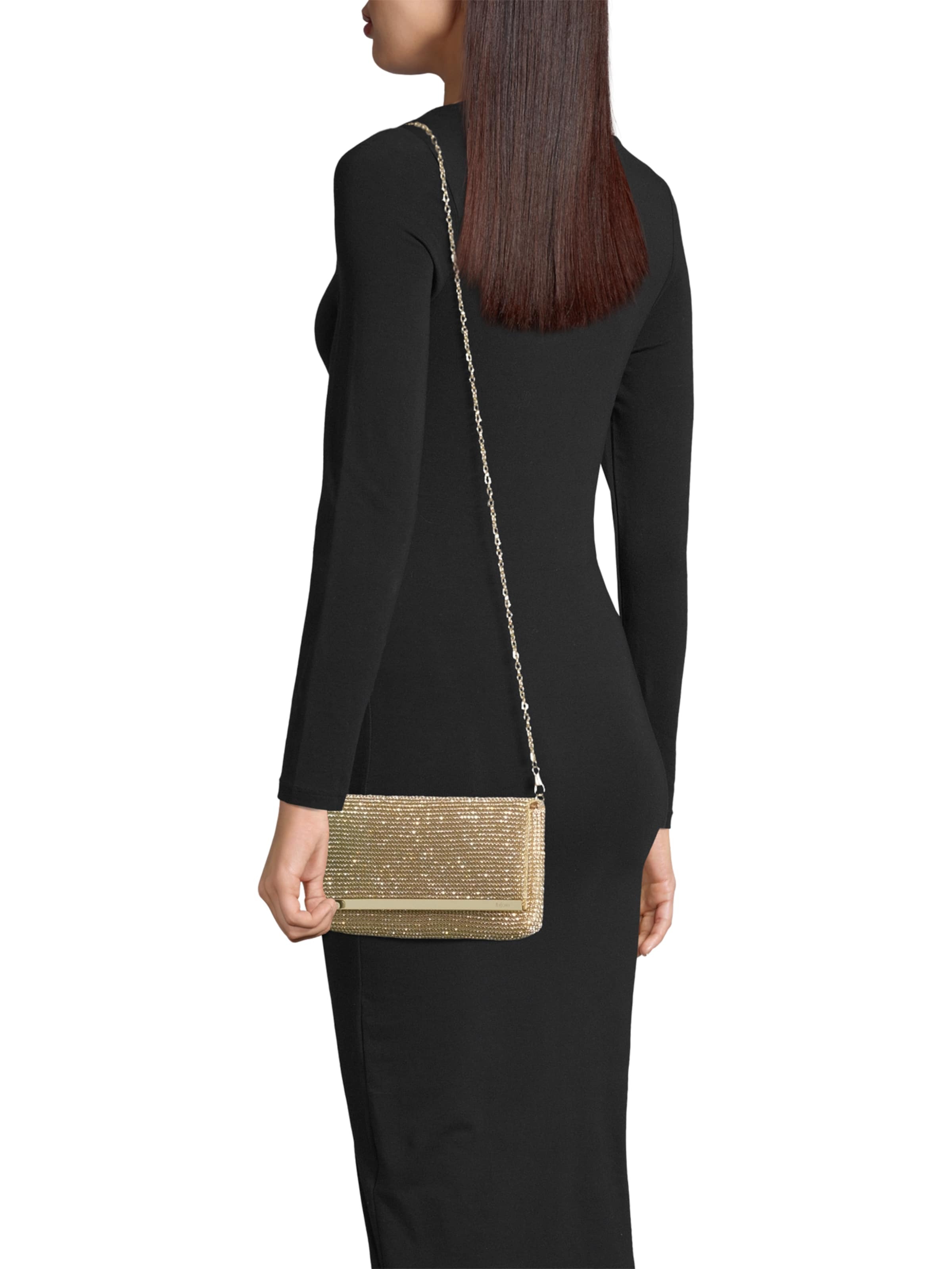 mascara Pismo torbica zlatna / srebro