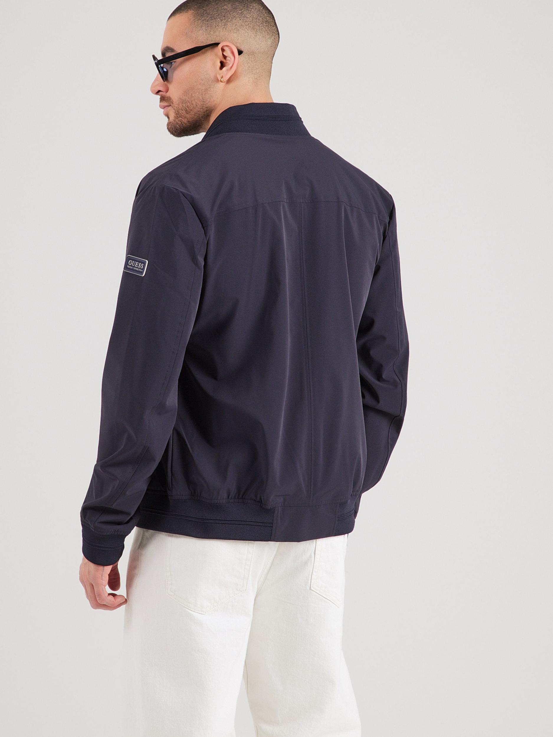 GUESS Prijelazna jakna tamno plava