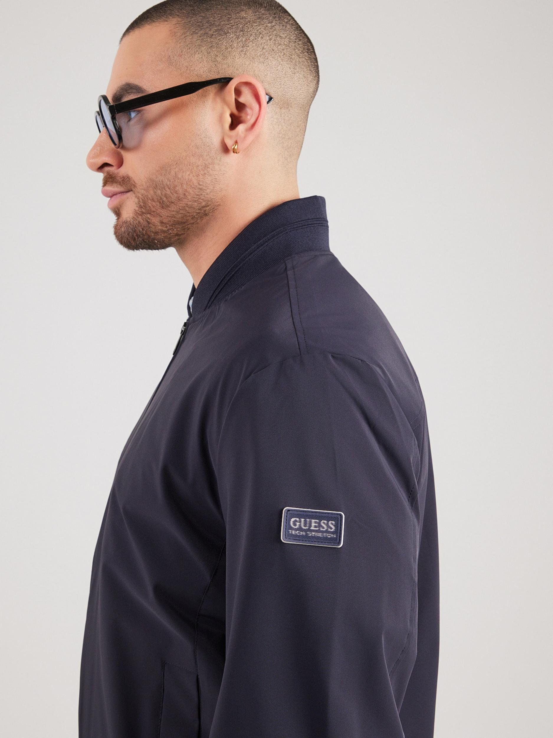 GUESS Prijelazna jakna tamno plava