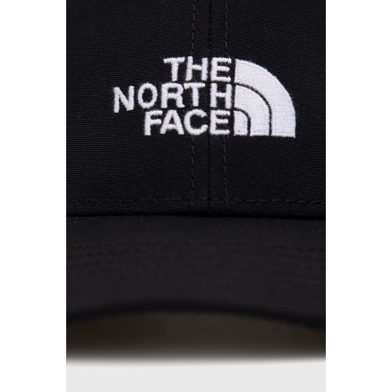 Dječja kapa sa šiltom The North Face boja: crna, s aplikacijom