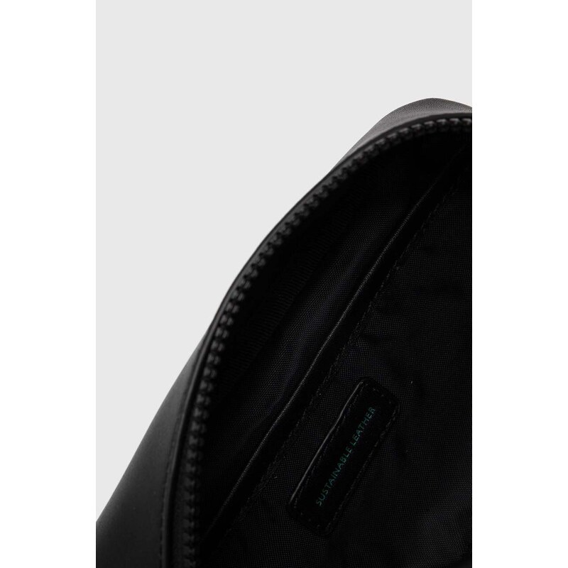 Kožna kozmetička torbica Tommy Jeans boja: crna