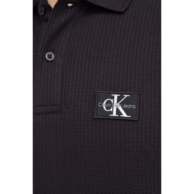 Polo majica Calvin Klein Jeans za muškarce, boja: crna, s aplikacijom