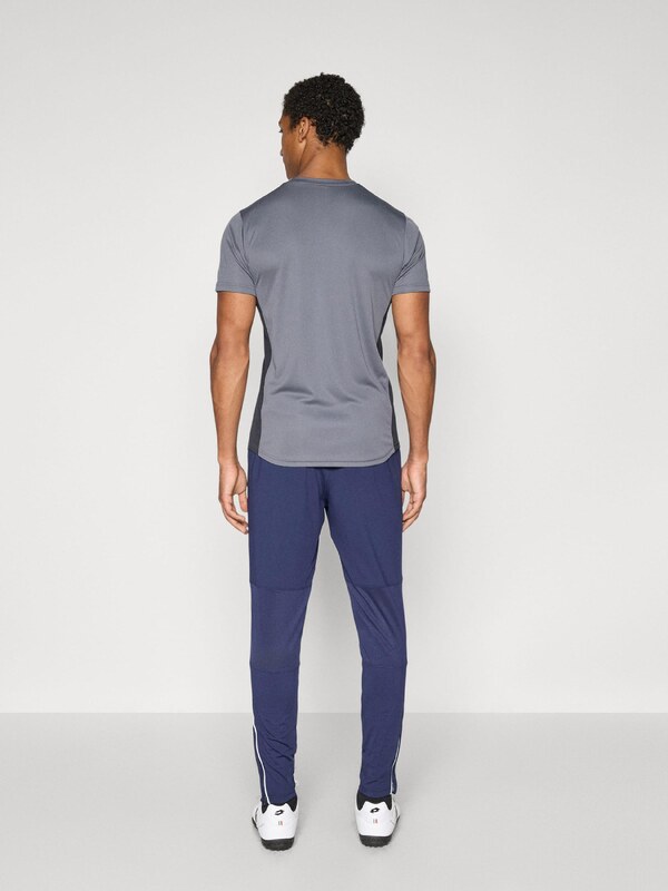 UNDER ARMOUR Sportske hlače 'Challenger' tamno plava / bijela