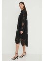 Pamučna haljina Herskind boja: crna, midi, oversize
